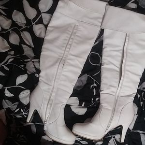 White heeled knee high boots